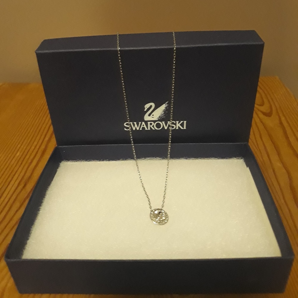 AUTH Swarovski necklace with round crystal pendant